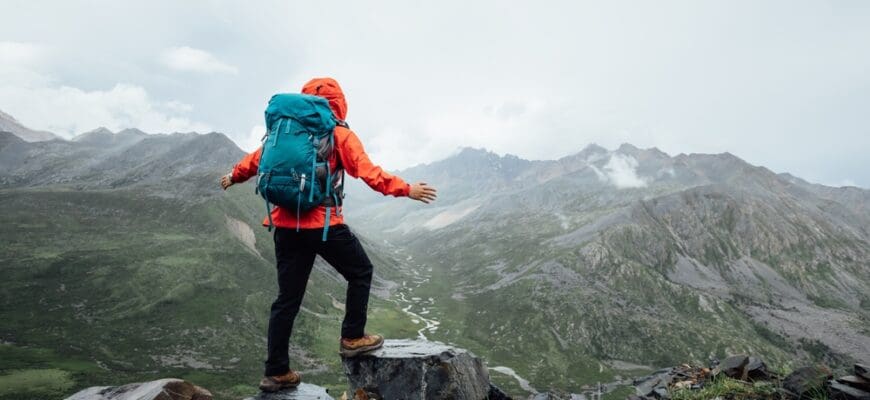 Hiking,Woman,On,High,Altitude,Mountain,Top