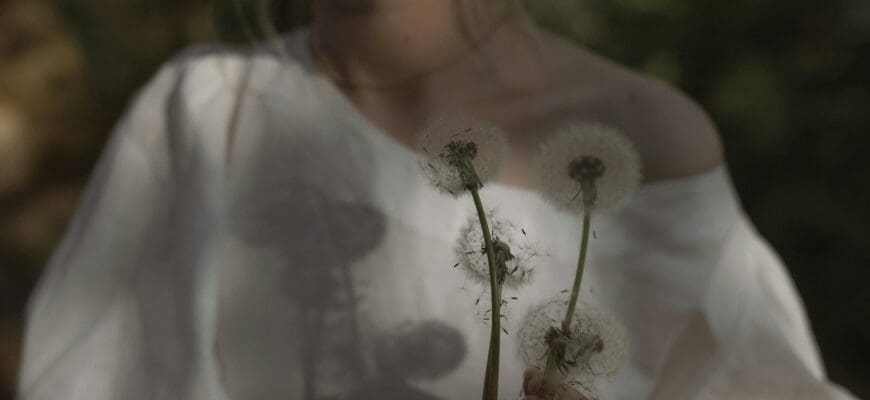 Woman holding daffodils